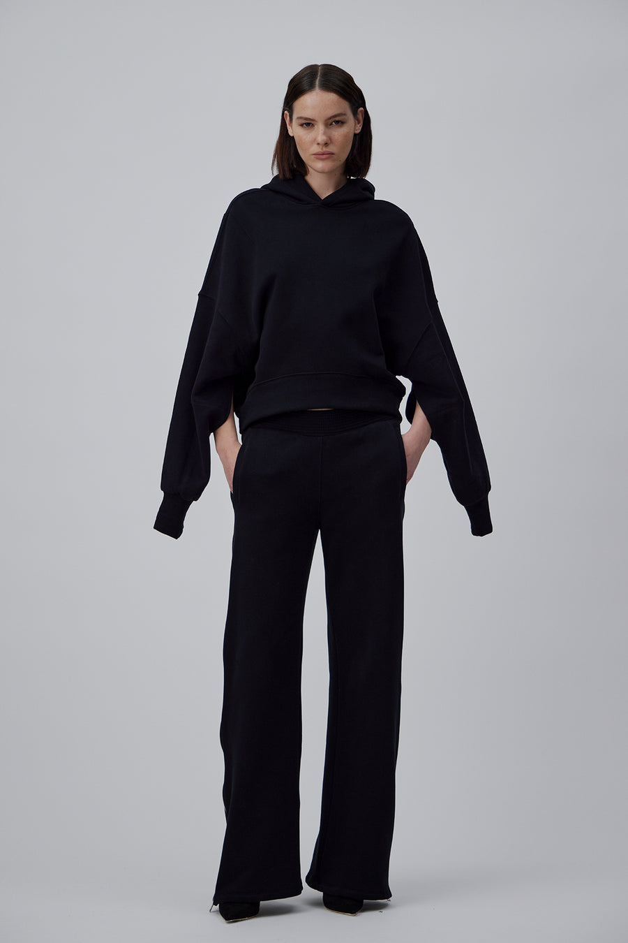 OVERSIZE JOGGER PANTS WITH ZIPPER ON THE SIDE IN GLOSSY BLACK