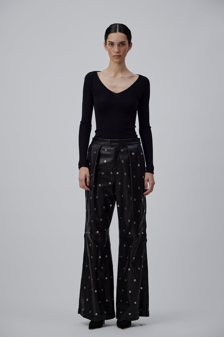 LOOSE FIT LEATHER PANTS WITH EYELETS IN GLOSSY BLACK