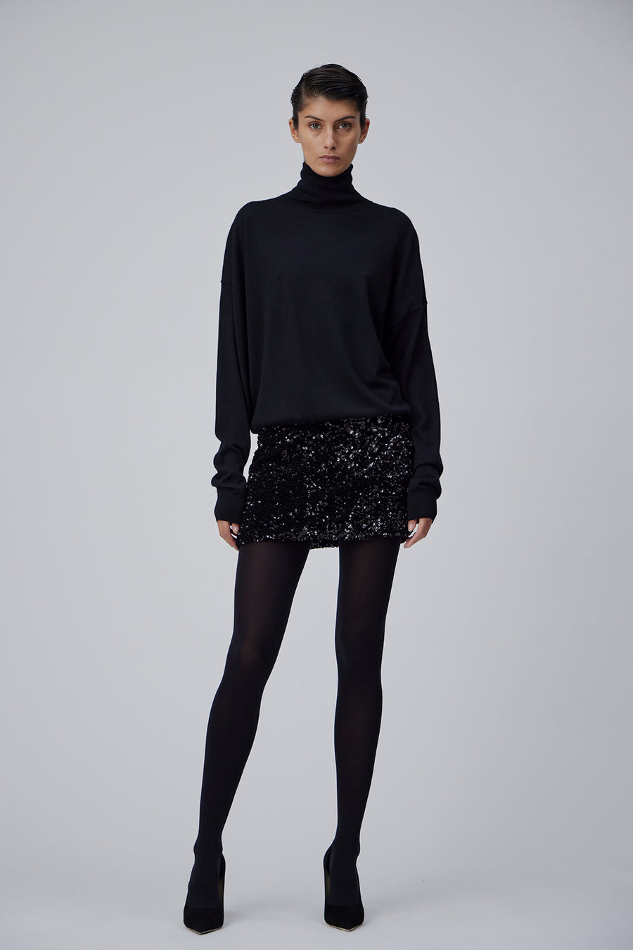 SEQUIN MINI SKIRT IN GLOSSY BLACK