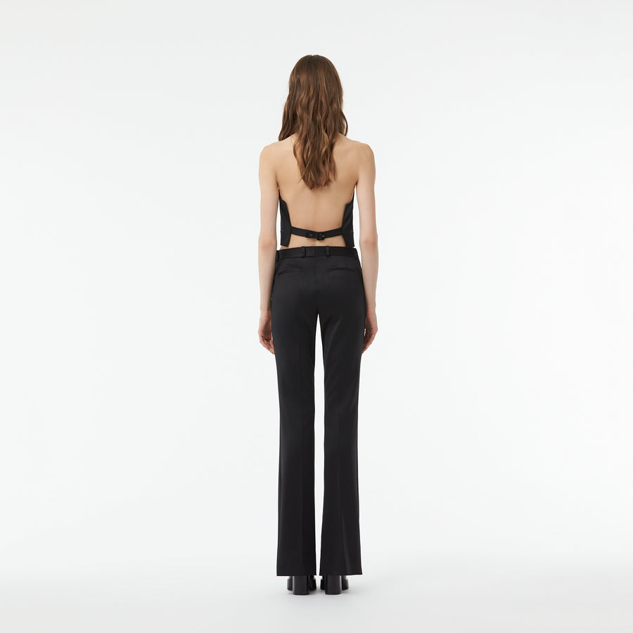 TAILORED FLARED PANTS WITH SLIT AT THE ANKLE IN BLACK WOOL TWILL